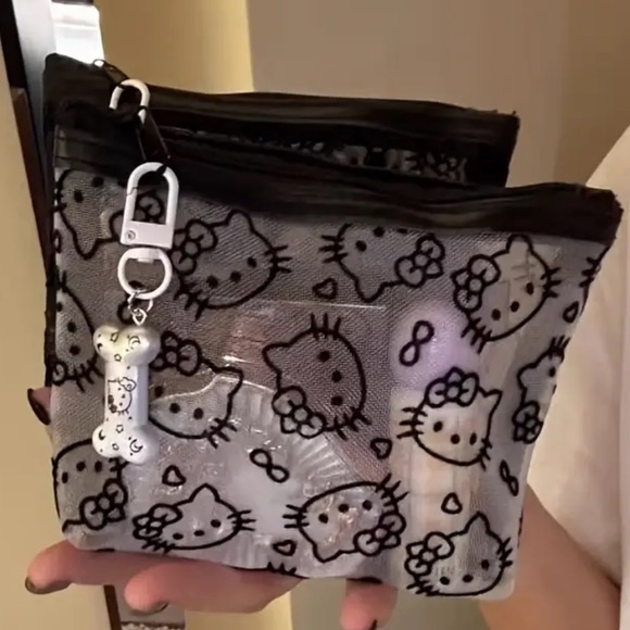 Hello Kitty Handbags - Hello kitty zip pouch bag